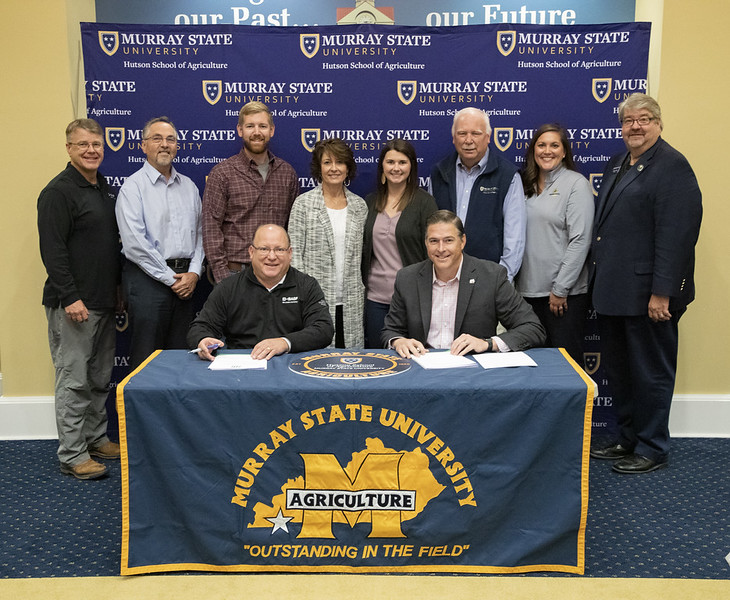 Scott Kay (BASF) and Mark Stewart (AFA) signing a Memorandum of Understanding with Murray State.